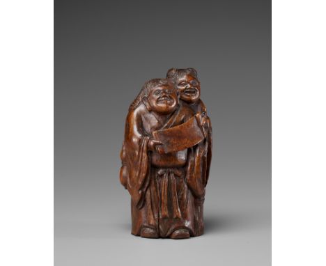 A BAMBOO CARVING OF THE HEHE ERXIAN, 18TH CENTURYChina. Finely carved as the twin immortals, one standing behind his brother 