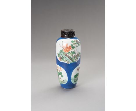 A POWDER BLUE GROUND FAMILLE VERTE OVOID VASE, LATE QING DYNASTYChina, Qing dynasty (1644-1912), 19th century. Of slender ovo