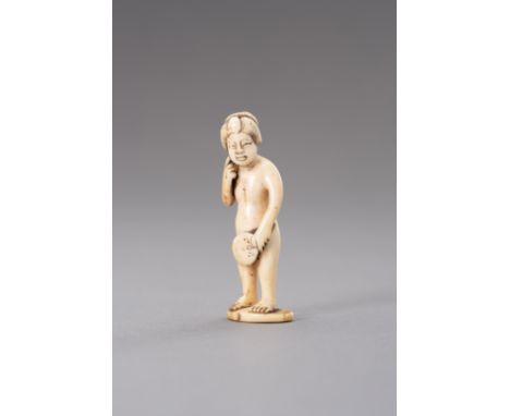 GYOKUZAN: AN IVORY NETSUKE OF A NUDE WOMAN WITH FANBy Gyokuzan, signed Gyokuzan Japan, 19th century, Edo period (1615-1868)Th