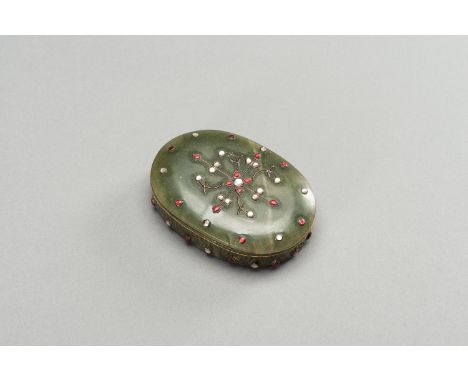A MUGHAL STYLE JADE BOX WITH COVER, LATE 19TH CENTURYIndia. Of oval shape, the cover and sides inlaid with mother of pearl an