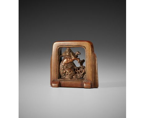 A WOOD NETSUKE OF A TSUITATE (STANDING SCREEN) WITH A SHISHI AND PEONYJapan, 19th century, Edo period (1615-1868)Well carved 