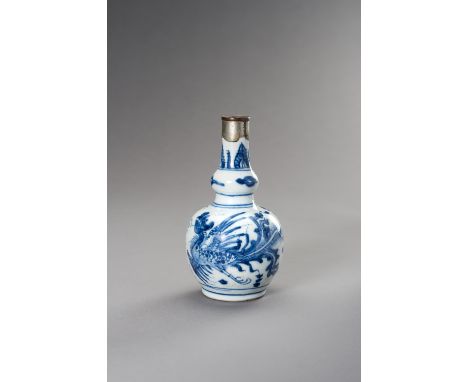 A SMALL BLUE AND WHITE DOUBLE GOURD WATER SPRINKLER, 17TH CENTURYChina, Kangxi period (1661-1722). In double gourd form, with