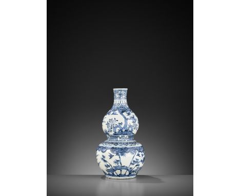 A BLUE AND WHITE 'THREE FRIENDS OF WINTER' DOUBLE-GOURD VASE, 17TH CENTURYChina. The exterior finely painted in underglaze bl
