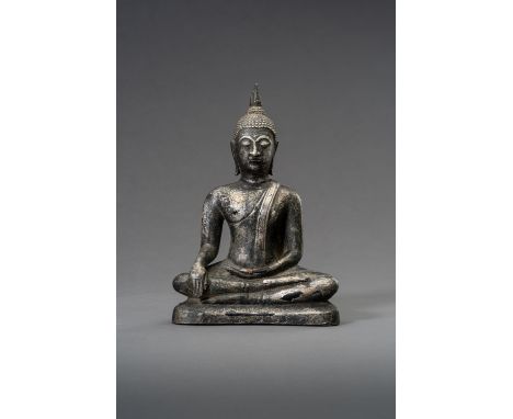 AN AYUTTHAYA STYLE REPOUSSE FIGURE OF BUDDHAThailand, 19th century. Seated in dhyanasana with his right hand lowered in bhumi