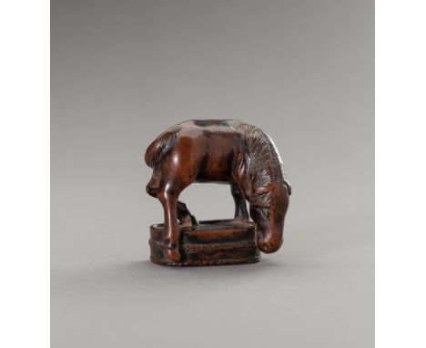 CHOZAN: A BOXWOOD NETSUKE OF A GRAZING HORSEBy Chozan (Tsuyama), signed Chozan 彫山 Japan, 19th century, Edo period (1615-1868)
