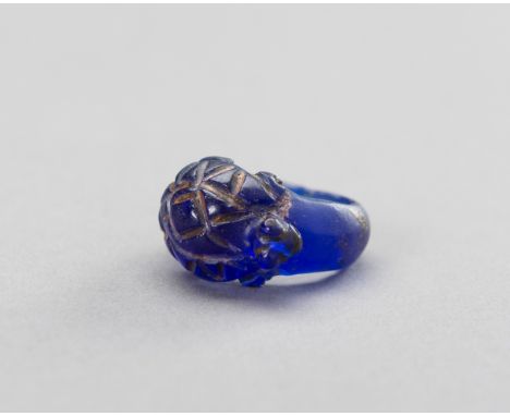 A BLUE ARCHAIC PYU CULTURE GLASS RING, 10TH CENTURYBurma/ Myanmar region, Pyu city states, circa 10th century. Carved as a ri