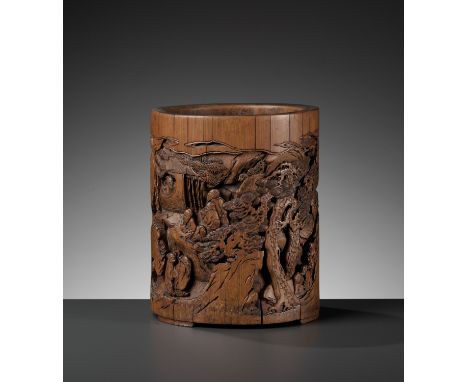 A BAMBOO 'SCHOLARS' BRUSHPOT, BITONG, BY SHEN DASHENGChina, 17th century. The cylindrical brushpot is supported on three shor