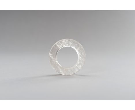 A ROCK CRYSTAL DISCChina, Qing Dynasty (1644-1912) or earlier. Of circular form, the translucent stone is brilliantly polishe