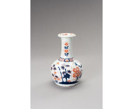 AN IMARI 'FLOWERS AND BAMBOO' PORCELAIN VASE, QING DYNASTYChina, 1644-1912. The bulbous body with a long neck and inverted ri