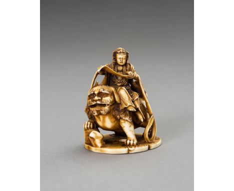 AN IVORY OKIMONO OF MONJU BOSATSUJapan, Meiji period (1868-1912)Finely carved and stained depicting the bodhisattva seated on