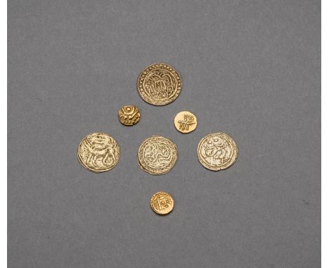 A GROUP OF SEVEN GOLD COINSIndia, Southeast Asia, 14th to 18th century. Comprising three fanam, one from the India-independen