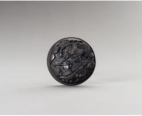 A PRESSED HORN MANJU NETSUKE WITH SAMURAIJapan, Meiji period (1868-1912)Of circular shape, fine relief with a samurai on hors