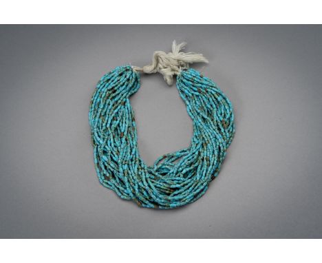 A BACTRIAN TURQUOISE BEAD NECKLACEAncient region of Bactria, presumably c. 2000 years old. The necklace consisting of ovoid t
