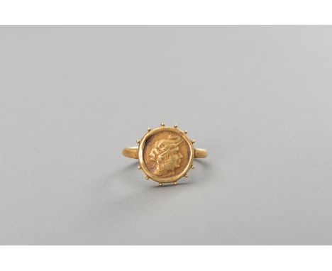 AN ANCIENT GANDHARAN COIN GOLD RINGThe coin dating to the 3rd-4th century, the mounting somewhat later. Finely crafted with s