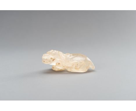 A FINE ROCK CRYSTAL 'BIXIE AND LINGZHI' GROUP, QING DYNASTYChina, 1644-1912. Carved in the shape of a Bixie with bulging eyes