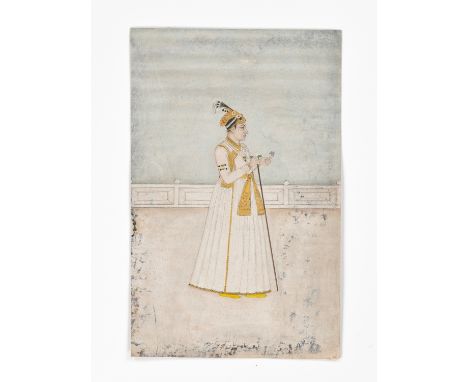 AN INDIAN MINIATURE PAINTING OF A MUGHAL COURTIERMughal India, 17th-18th century. Ink, watercolors, and gold on wasli. The co