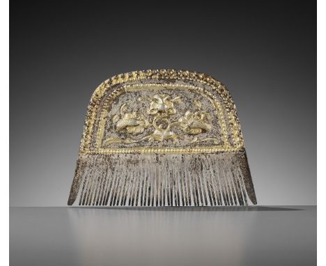 A PARCEL-GILT SILVER COMB, TANG DYNASTYChina, 618-907. The gilt upper section of the comb is decorated in repousse with styli