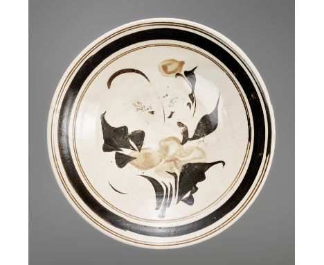 A CIZHOU PAINTED SHALLOW BOWL, JIN DYNASTYChina, 1115-1234. The conical sides rising from the thick and slightly spreading fo