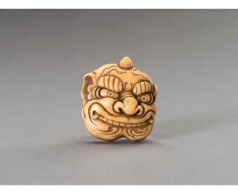 A NETSUKE OF AN ONI MASKJapan, Meiji period (1868-1912)The celluloid netsuke depicting a mask of an oni, with a small horn on