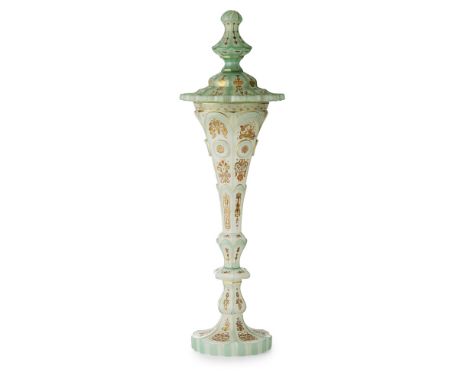 LARGE FRENCH OPAQUE GLASS VASE AND COVER19TH CENTURY with a large cut-finial handle above the lobed domed cover, raised on an