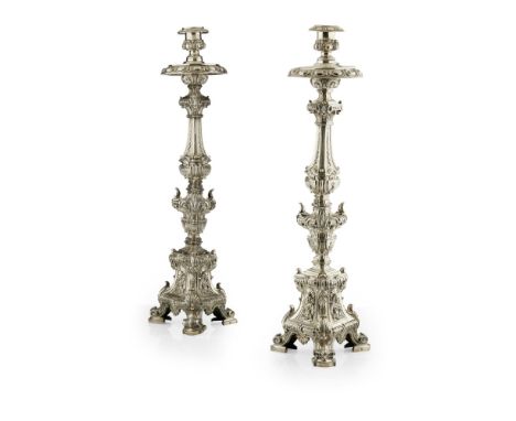 PAIR OF PORTUGESE SILVER ALTER CANDLESTICKS18TH CENTURY Lisbon, maker A/IG, the column of triangular form, decorated with scr