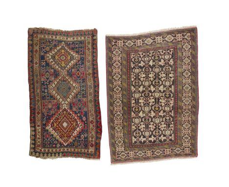 TWO SHIRVAN RUGSEAST CAUCASUS, LATE 19TH/EARLY 20TH CENTURY the first of Konagkend pattern, the indigo field with allover sty