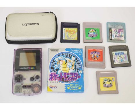 Game Boy Color console, together with seven Pokémon Pocket Monsters games including a boxed 1996 game including manual, map a