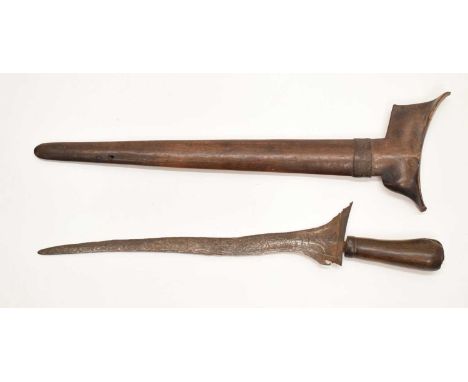 19th century Indonesian dagger 'Kris', 34cm wavy pamor blade, a round horn hilt with old repair to the top, in its wooden sca
