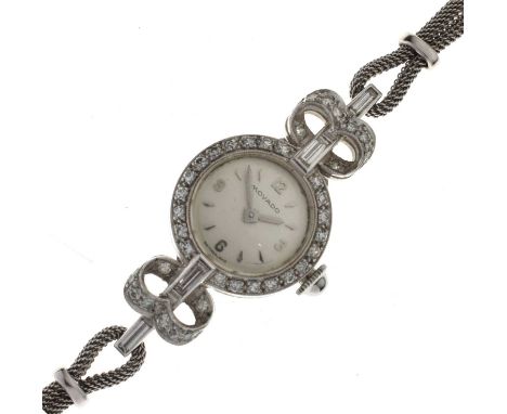 Movado - Lady's cocktail watch, the platinum case with diamond set bezel housing manual wind movement with silvered dial, 18m