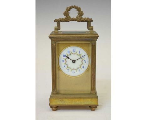 French gilt metal cased carriage timepiece, the circular enamel dial with blue Arabic hour markers, floral swag and blued ste