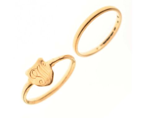 22ct gold wedding band, size K½ approx, and an unmarked yellow metal band with a shield-shaped panel, size N approx, (tests a