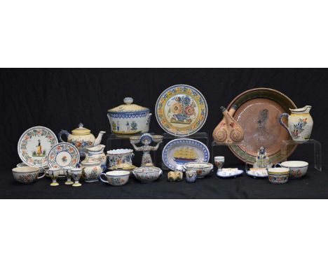 Large quantity of handpainted Breton Quimper pottery plates, bowls, etc., 21cm diameter and smaller