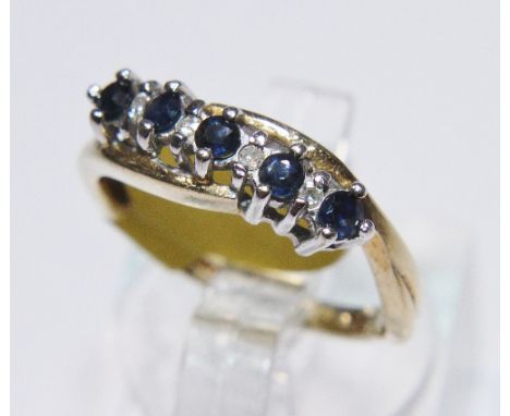 HALF ETERNITY RING. 9 ct sapphire and diamond half eternity ring size K 1/2