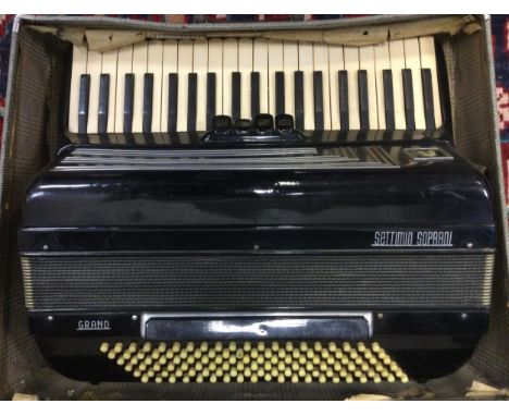 A Settimio Grand Piano Accordian, black case, 120 button, 41 keys, black travelling case, 52cm wide, 41cm long closed. 