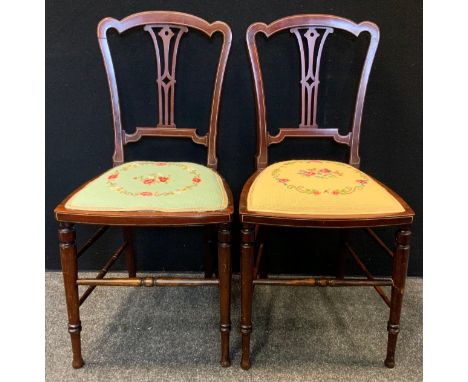 A Pair of Edwardian mahogany Bedroom chairs, pierced splat, turned legs and stretchers, padded tapestry seats, 84cm tall, (2)