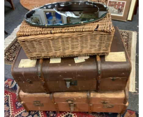 A brown luggage trunk, another;  wicker basket, wall mirror (4) 