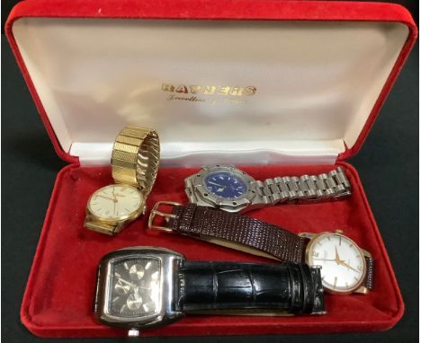 A 1950s Accurist 9ct gold cased wristwatch, textured silver dial, Arabic numerlas and baton markers, minute track, centre sec