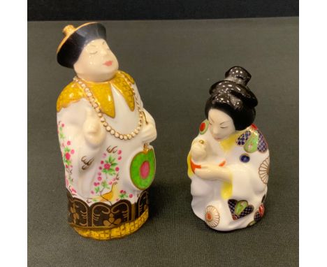 A Royal Worcester Connoisseurs Collection Mandarin Candle snuffer; another Japanese Girl, both pink marks (2) 