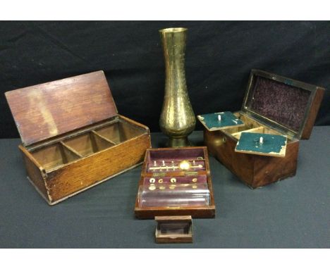 A 19th century hydrometer set, mahogany case; a 19th century mahogany tea caddy, c. 1820; a 19th century rosewood matchbox; a