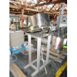 Cap feeder system Loading Fee of __$55 ____ to be added to winning bidder's invoice.