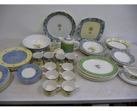 Royal Doulton 'Carmina' part dinner service comprising 7 oval platters, 3 oval bowls, 5 dinner plates, 8 side plates in 2 des