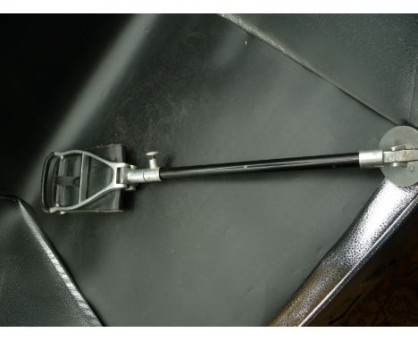 A black leather shooting stick&nbsp;