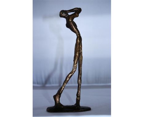 Bronze sculpture in the manner of Giacometti,subject an abstract figure of a golfer in mid swing! H 24cm x W 9.5cm