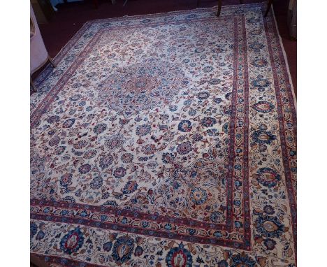 A fine Central Persian Kashan carpet, central double pendant medallion with repeating spandrels on an ivory field complimente