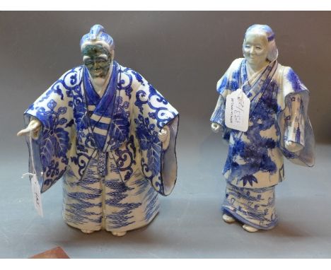Two contemporary Japanese ceramic blue and white masked figures in traditional dress
