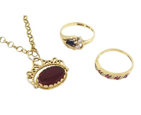 Gold black onyx and agate swivel fob pendant necklace, gold ruby and diamond half eternity ring and a cubic zirconia ring, al