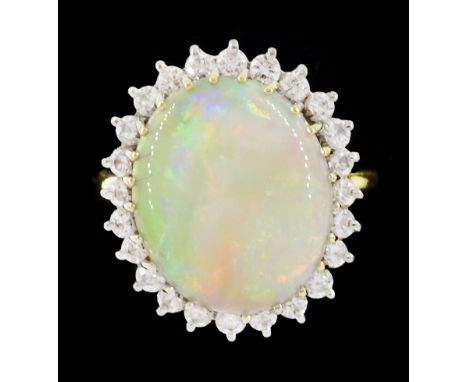 18ct gold opal and round brilliant cut diamond cluster ring, hallmarkedCondition Report:Approx 4.6gm, size L-M, overall head 
