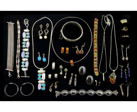Silver and stone set silver jewellery including amber bracelet, pendant necklaces and earrings, hematite bracelet and pair of