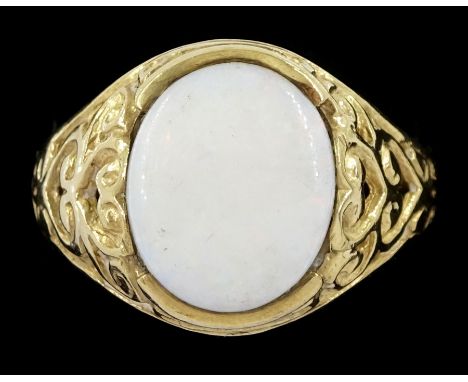 9ct gold oval opal ring, with fancy heart pierced scroll shoulders, hallmarkedCondition Report:Approx 3.45gm, size S-T