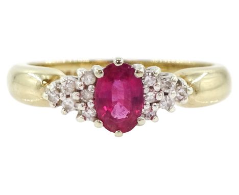 9ct gold oval cut ruby and round brilliant cut diamond cluster ring, hallmarkedCondition Report:Approx 3.1gm, size O-P, good 